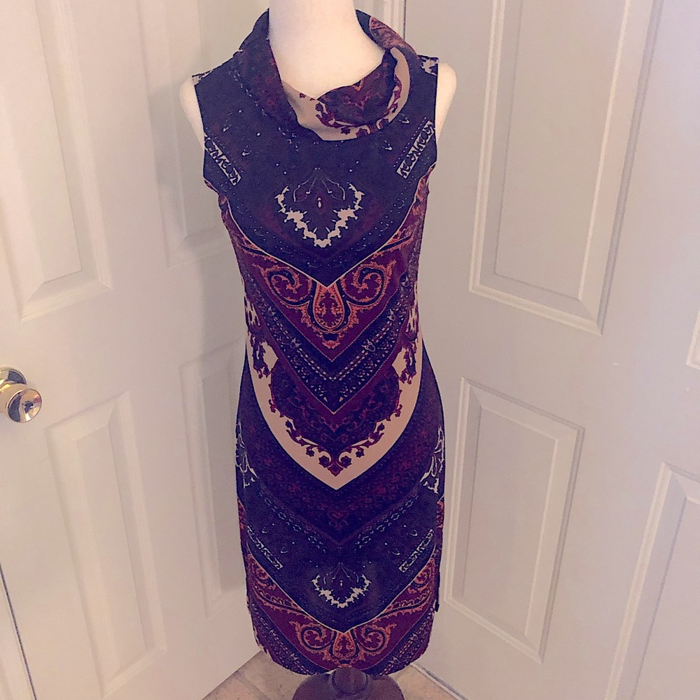 Sleeveless Dress with Cowl Neckline.